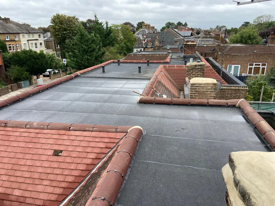 Finished flat roof with clay ridge tiles along the edges, Imperial Roofcraft roofing job in London