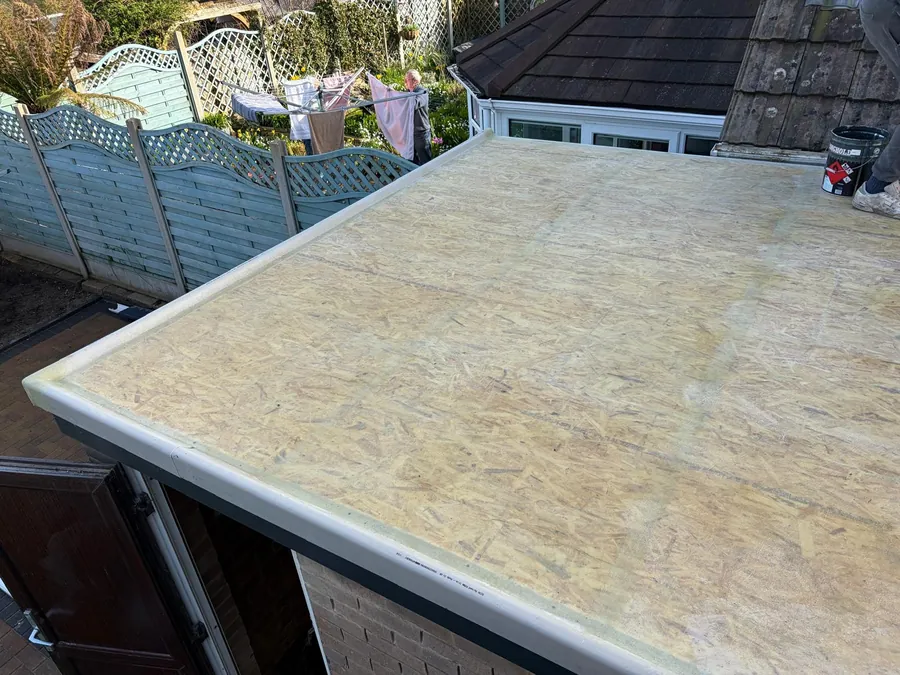 New OSB deck on a flat roof before the covering goes on, Imperial Roofcraft roofing job in London and Surrey