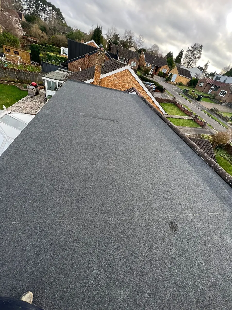 Finished dormer flat roof looking out over the street, Imperial Roofcraft roofing job in London and Surrey
