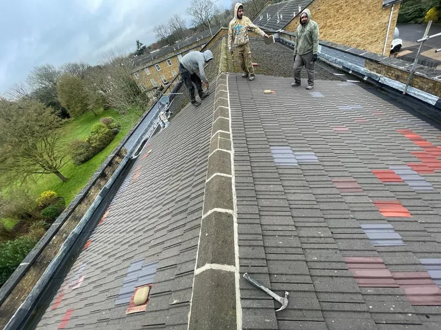 Old grey tiles marked up before a full re-roof, Imperial Roofcraft roofing job in London and Surrey