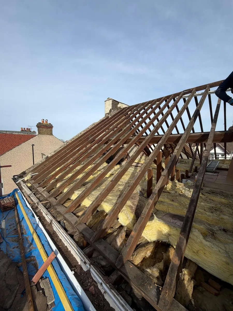 Stripped rafters and eaves timbers ready for new membrane, Imperial Roofcraft roofing job in London and Surrey
