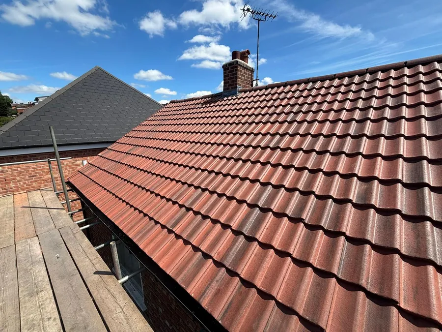 Completed red interlocking tile roof on a bungalow, Imperial Roofcraft roofing job in London and Surrey