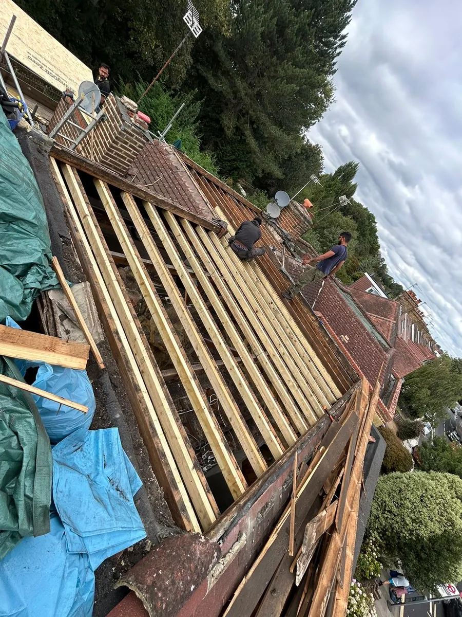 Roof stripped back to the battens during a re-roof, Imperial Roofcraft roofing job in London