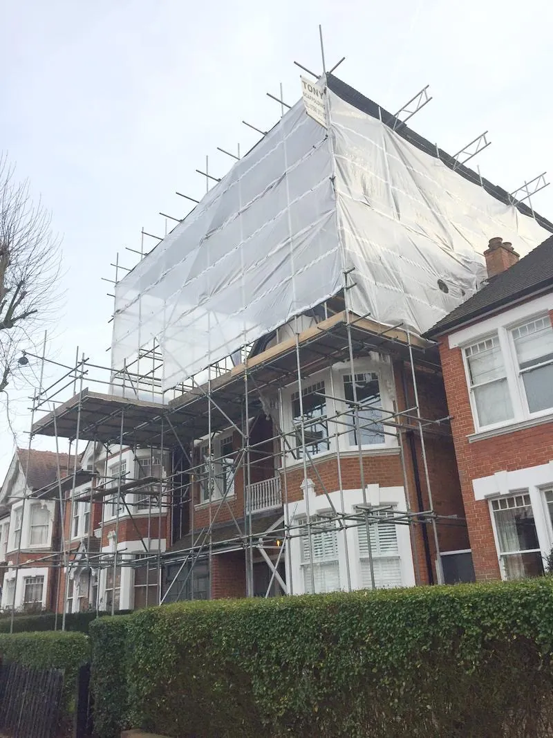 Scaffold and sheeting up around a period house for roof work, Imperial Roofcraft roofing job in London
